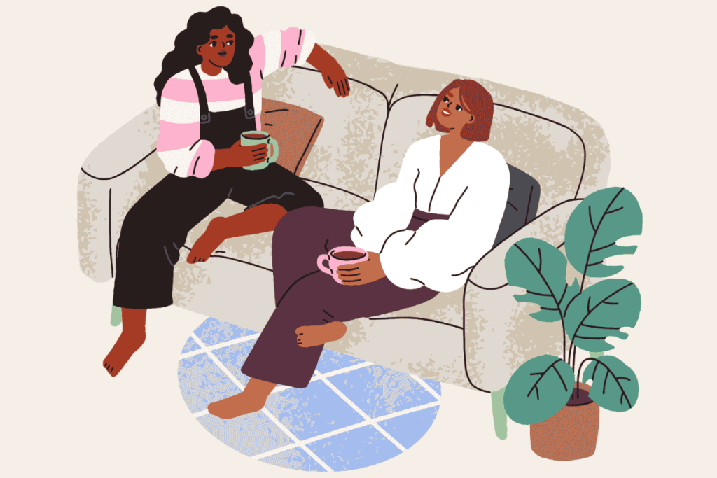 A couple sitting together having a heartfelt conversation about pregnancy.