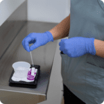 A nurse giving a lab-grade pregnancy test